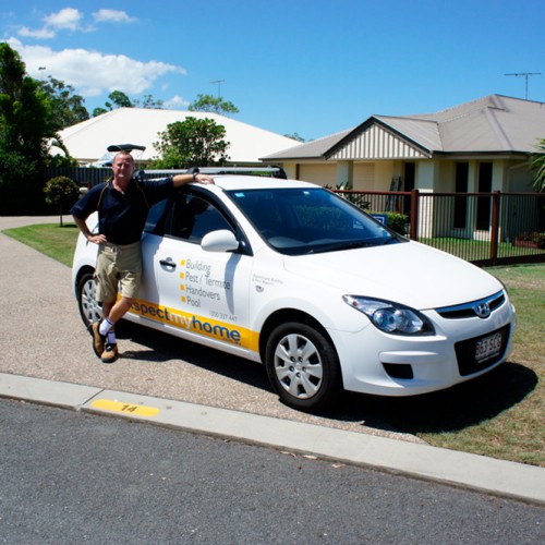 James building and pest inspector with vehicle
