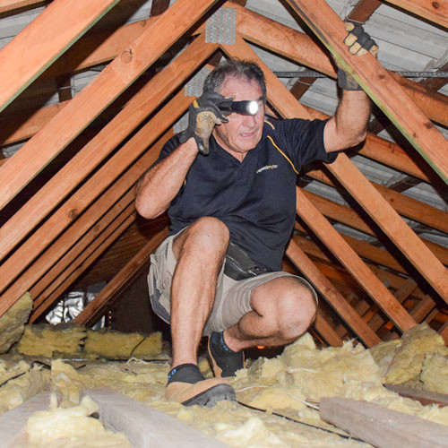 Glen conducting inside roof inspection